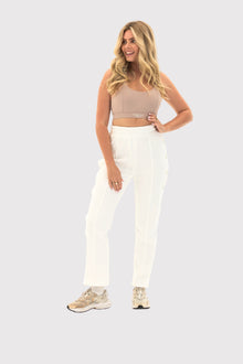 Flexara™ Nude Light Support Sports Bra styled on model