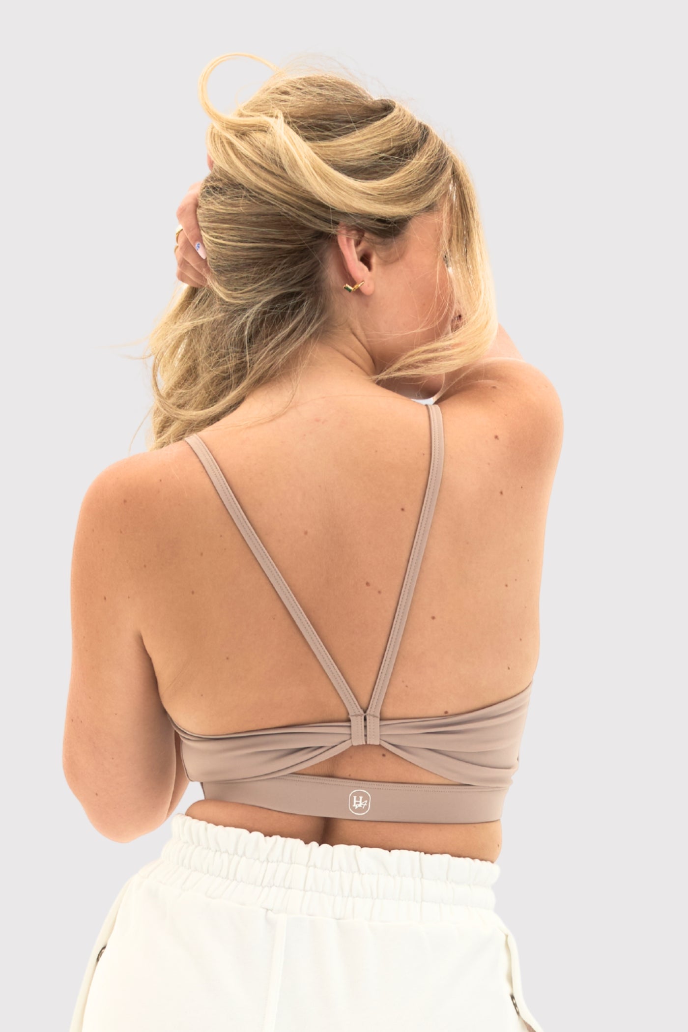 Flexara™ Nude Strappy Sports Bra – open-back detail